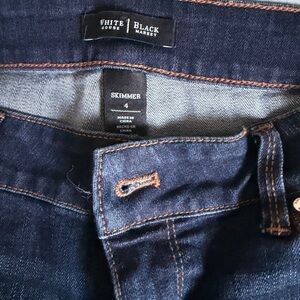 White House Black Market ladies  Dark Blue Skinny Jeans.  L
